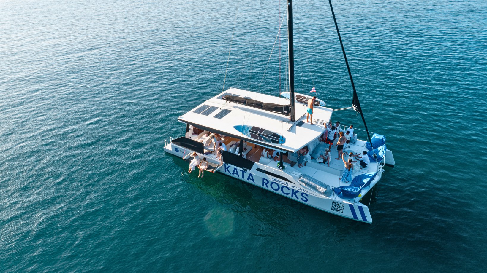 an aerial view of a catamaran with people on it phuket island trip cruise